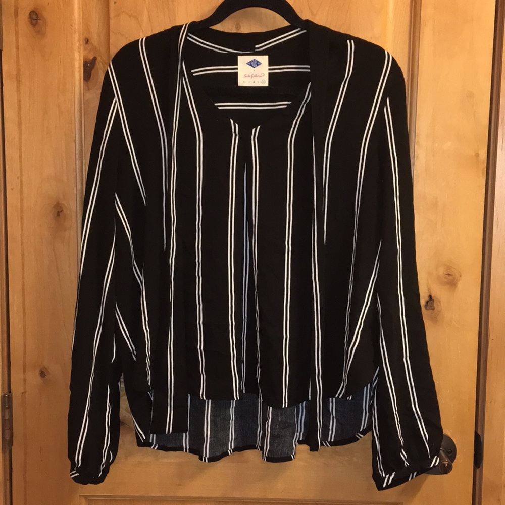 Black and white long sleeve top.